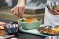 Bibimbap, Traditional Korean cuisine bibimbap, Chef preparing Korean food, chef cooking in kitchen Royalty Free Stock Photo