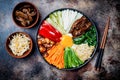 Bibimbap, traditional Korean dish, rice with vegetables and beef.