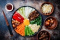 Bibimbap, traditional Korean dish, rice with vegetables and beef. Royalty Free Stock Photo