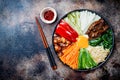 Bibimbap, traditional Korean dish, rice with vegetables and beef. Royalty Free Stock Photo