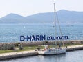 Bibinie, D-Marina, Croatia - sept 9 2018: Logo at the etnrance in mediterranean marina near Sukosan town. The sailing boat mouring