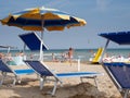 BIBION, ITALY - AUGUST 21, 2019: beach with umbrellas and sunbeds Royalty Free Stock Photo