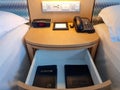 A bible and Al-Qur'an inside drawer in a hotel room