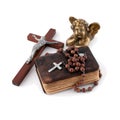The bible with beads, an angel and a crucifixion Royalty Free Stock Photo