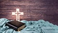 Bible and cross on blue background Christian concept. communion.