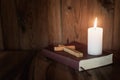 Bible, cross, symbol and red heart Candle light Symbol of supplication and faith The Study of Christ Believing in God, escape, Royalty Free Stock Photo