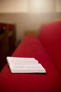 Bible Laying on a Church Pew Royalty Free Stock Photo