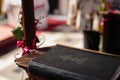 Bible lying on a church bench