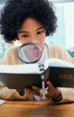 Bible, magnifying glass and woman search with investigation, religion research and Christian study. Book, learning and