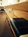 Bible in pew Royalty Free Stock Photo