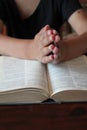 Bible and  pray  hands together background with copy space  table Royalty Free Stock Photo