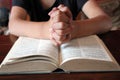 Bible and  pray  hands together background with copy space  table Royalty Free Stock Photo