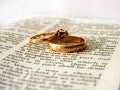 Bible and rings Royalty Free Stock Photo