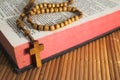 Bible with rosaries-beads crucifix Royalty Free Stock Photo