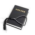 Bible with rosary, white background Royalty Free Stock Photo