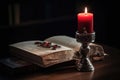 Bible with silver Cross with red candle Royalty Free Stock Photo