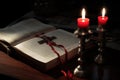 Bible with silver Cross with red candle, AI Royalty Free Stock Photo