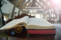 Bible verse quote - If you love me, keep my commands. John 14:15 on background of open page of bible book and light in the church Royalty Free Stock Photo