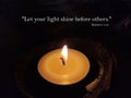 Bible verse quote - Let your light shines before others. Matthew 5:16. With one candle light in the night on dark background. Royalty Free Stock Photo