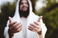 Biblical scene - of Jesus Christ landing his hands with a blurred background Royalty Free Stock Photo