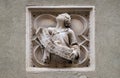 Biblical story, tile relief, external wall of Orsanmichele Church in Florence, Italy