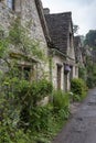 Traditional cotswold stone cottages built of distinctive yellow limestone in the famous Arlington Row, Bibury Gloucestershire UK Royalty Free Stock Photo