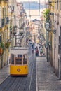 The Bica Funicular Elevador or Ascensor da Bica is a famous tourist attraction in Chiado District. Sunny day in summer. Travel