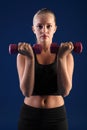 Bicep curl anaerobic exercise young fitness woman Royalty Free Stock Photo