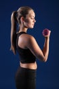 Bicep curl by beautiful young fitness woman Royalty Free Stock Photo