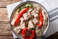 Bicol Express with red and green chili close-up in a bowl. horizontal top view Royalty Free Stock Photo
