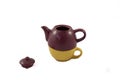 Bicolor ceramic teapot on white background.
