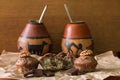 Bicolor muffin and two gourds with yerba mate Royalty Free Stock Photo