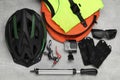 Bicycle accessories and equipment on grey textured background, flat lay Royalty Free Stock Photo
