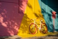 Bicycle against a vibrant wall outdoors