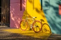 Bicycle against a vibrant wall outdoors