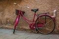 Bicycle in the backyard of the old town in Piombino, Tuscany, Italy Royalty Free Stock Photo