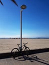 It is a bicycle, beach and sea