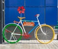 Bicycle with Bike Rental sign and flower Royalty Free Stock Photo