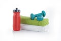 Bicycle bottle with dumbbells and towels. Summer sport