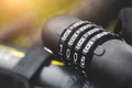 Bicycle cable with combination lock for bike safety Royalty Free Stock Photo