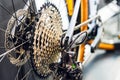 Bicycle cassette sprocket rear wheel closeup, background texture