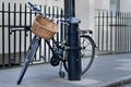 Bicycle chained to a lampost in London