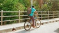 Bicycle commuter on Tejgaon Flyover bridge