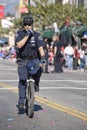 Bicycle Cop doing Crowd Control Royalty Free Stock Photo