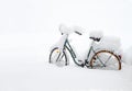 bicycle covered with a layer of snow Royalty Free Stock Photo