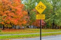 Bicycle Crossing Sign in English and French Royalty Free Stock Photo