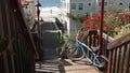 Bicycle cruiser bike by ocean beach, California coast USA. Summertime cycle, stairs and palm trees. Royalty Free Stock Photo