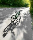 Bicycle on a deserted road Royalty Free Stock Photo