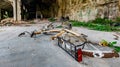 Bicycle fallen to the ground in an abandoned and ruined place