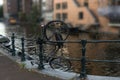 Bicycle falling down into Amsterdam canal Royalty Free Stock Photo